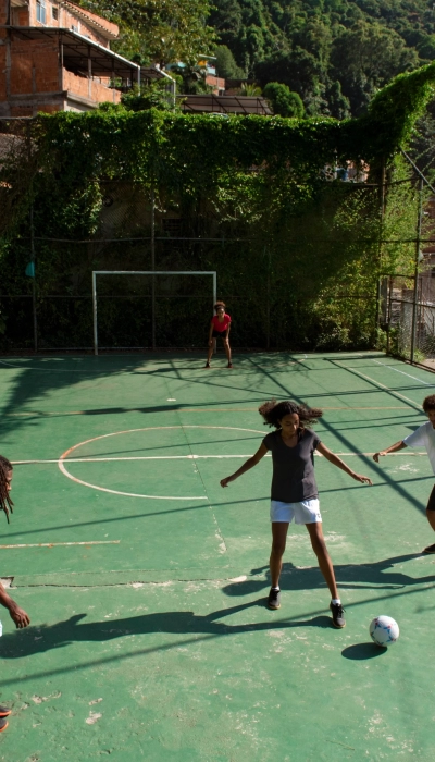 full-shot-friends-playing-soccer