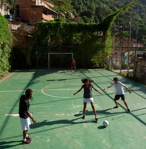 full-shot-friends-playing-soccer