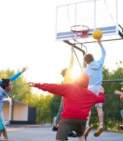 slam-dunk-young-caucasian-basketball-players-boys-throwing-ball-into-basketball-hoop